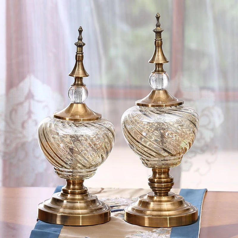 Ornate glass decorative jars with gold-tone finials; sizes sold separately